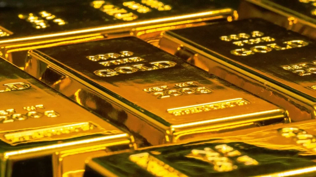 Gold bars and upward trend arrow representing record gold prices rally